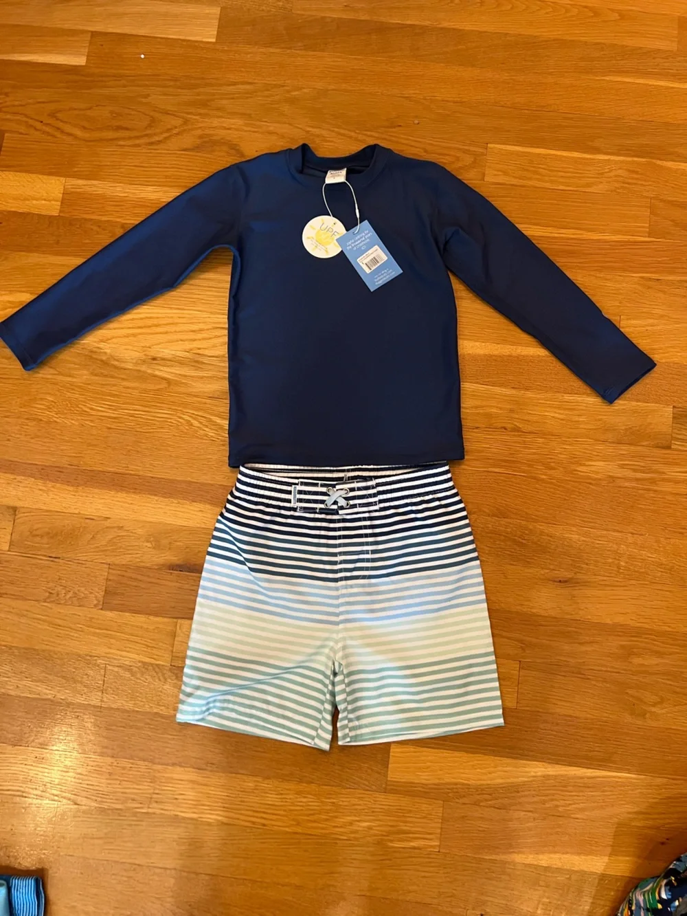 Ruffle Butts Navy Blue Long Sleeve Rash Guard